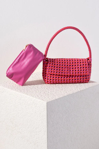 pink woven shoulder bag 
