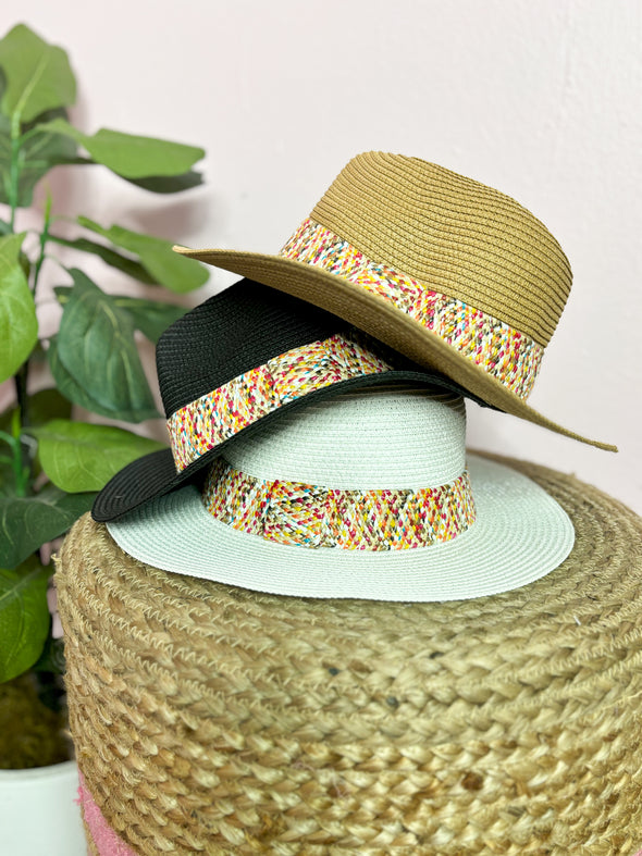 tan, black, and white hats with mutli colored band