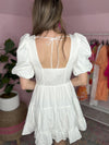 back cut out of short white dress