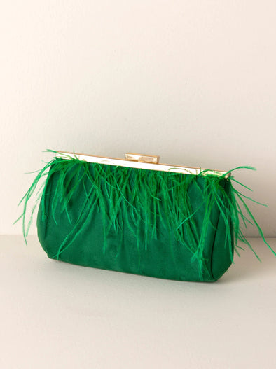 green clutch with ostrich feathers