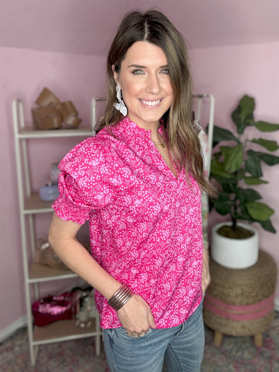 pink top with flowers 