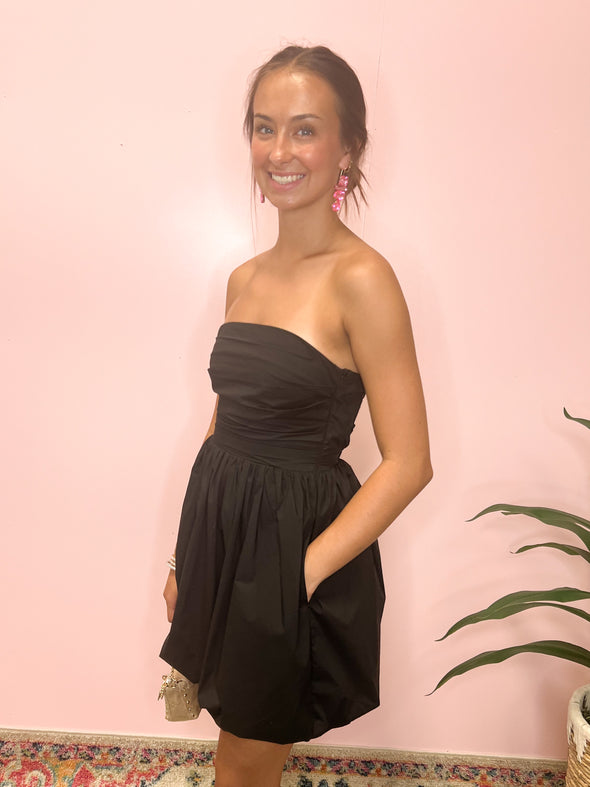 strapless black bubble dress with pockets