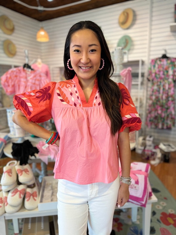 pink and orange embroidered top 