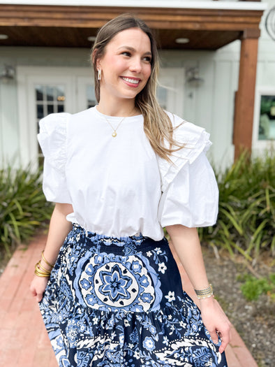 white top with ruffles 