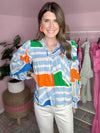 blue and orange and green geometric top 