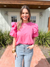 pink top with ruffles