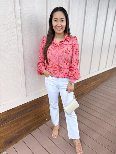 pink top with red and white floral 
