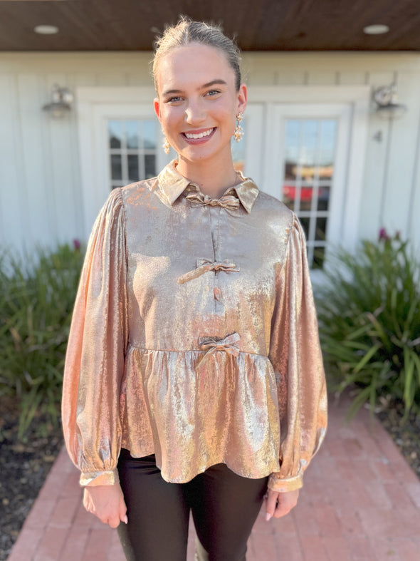 The Goldie Metallic Peplum Bow Top-Gold