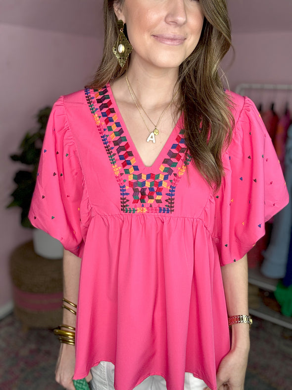 pink top with multi color embroidery 
