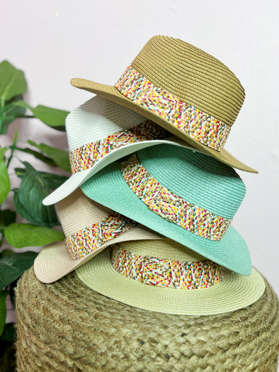 tan, white, turquoise, natural, and beige hats with multi colored band 