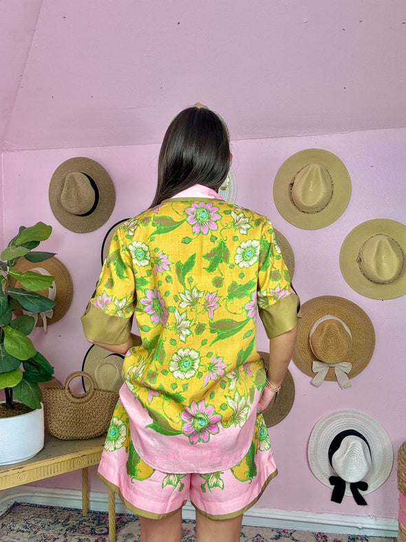 pink and yellow floral button down top and matching shorts 