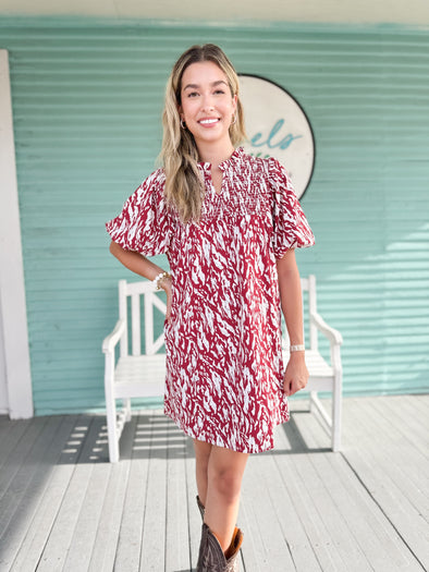 Maroon and white dress with smocked neckline 